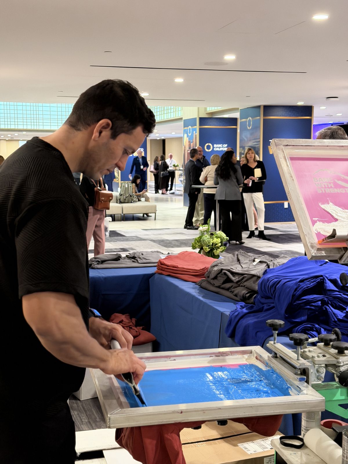 Merch Troop live printing — the line forms fast